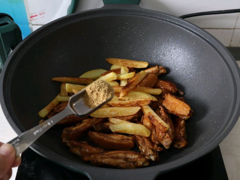 Pan Fried Cumin Chicken Wings and Potato Strips